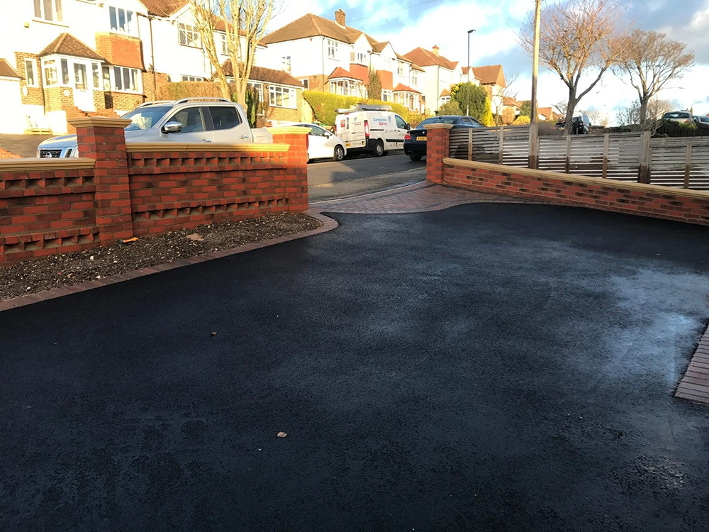 New tarmac driveway with block paving apron completed in Sutton